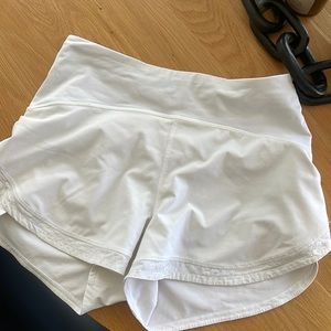 Speed Up Mid-Rise Lined Short white with design on lining. Lightly worn, size 4